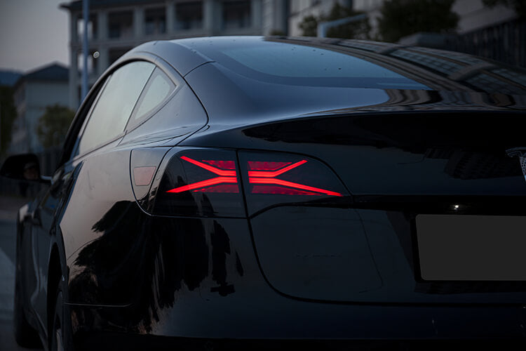zoom in view of Tesla rgb and led tail light at dawn